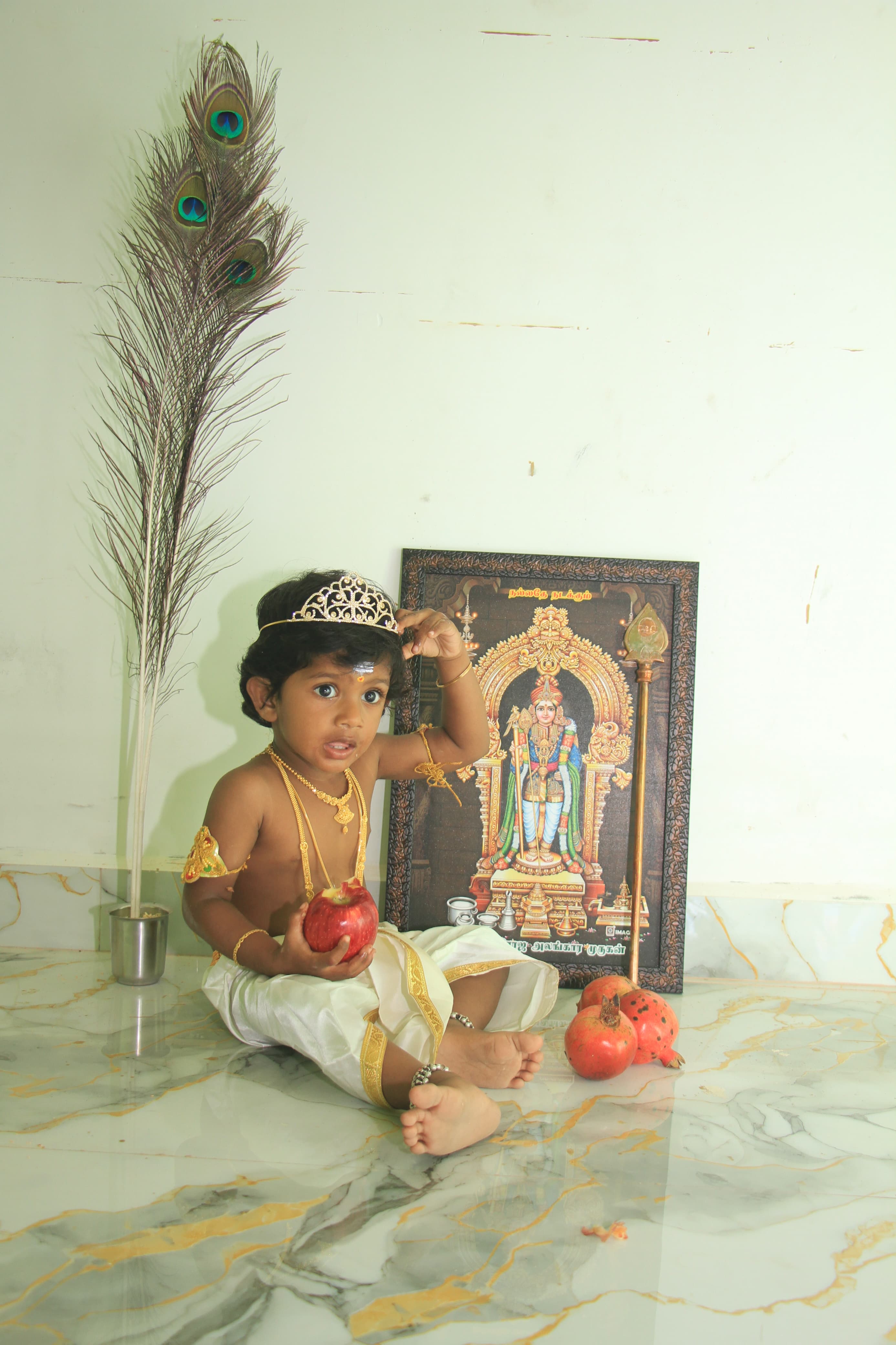 Baby in a natural setting surrounded by greenery